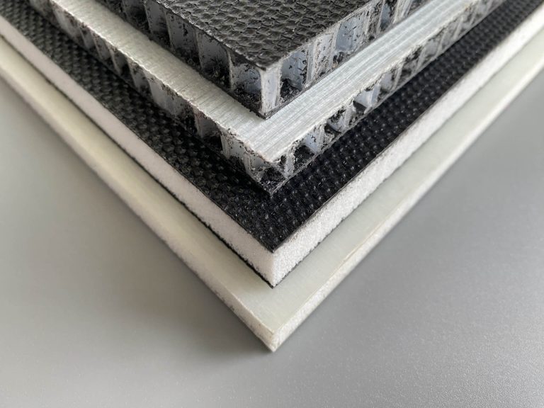 An image depicting sandwich-structured Composite Floors, showcasing their unique multi-layered design that emphasizes both high strength and lightweight properties.