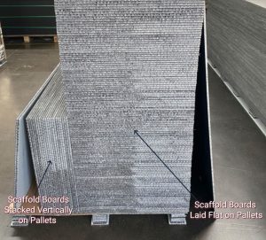 Image shows scaffold boards flat and vertical seperately on one pallet.