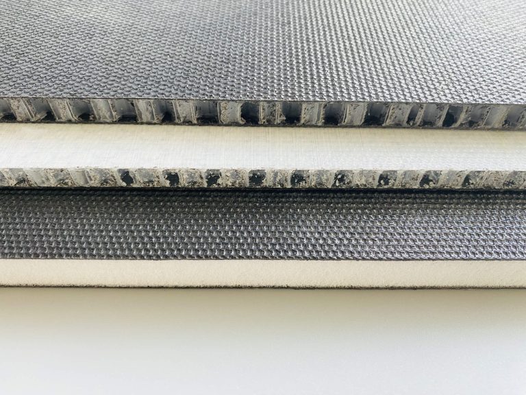 An image illustrating the side profile of sandwich-structured Composite Floors, highlighting their robust construction and impressive lightweight characteristics.