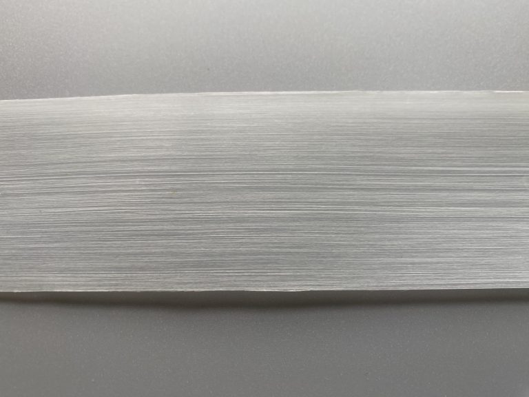 This is a display showcasing glass fiber reinforced HDPE tape.