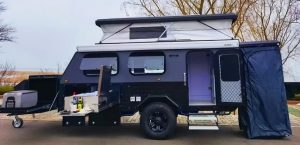 A luxury recreational vehicle (RV) produced by Rongcheng, featuring a modern and stylish exterior, parked in the exhibition area. The vehicle boasts smooth body lines and spacious, bright windows, hinting at the ample interior space. This RV exemplifies Rongcheng's exceptional craftsmanship and innovative design in the RV manufacturing industry, highlighting its leading position in the production and export of RVs in China.