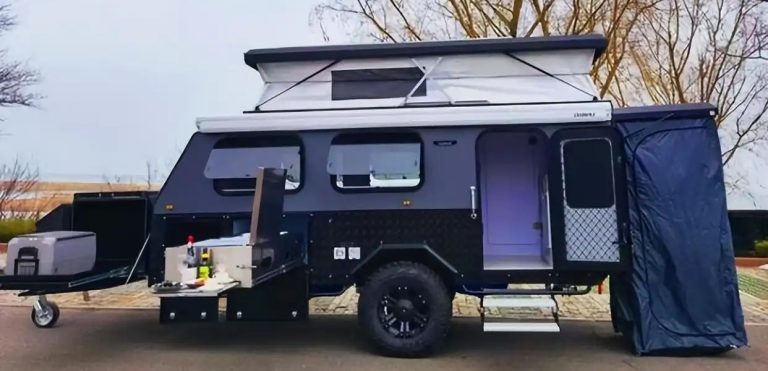 A luxury recreational vehicle (RV) produced by Rongcheng, featuring a modern and stylish exterior, parked in the exhibition area. The vehicle boasts smooth body lines and spacious, bright windows, hinting at the ample interior space. This RV exemplifies Rongcheng's exceptional craftsmanship and innovative design in the RV manufacturing industry, highlighting its leading position in the production and export of RVs in China.