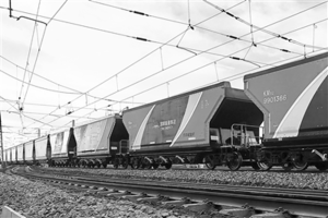 A depiction of the world's initial lightweight heavy-duty railway freight cars constructed using carbon fiber composites, showcasing their innovative design and advanced materials.